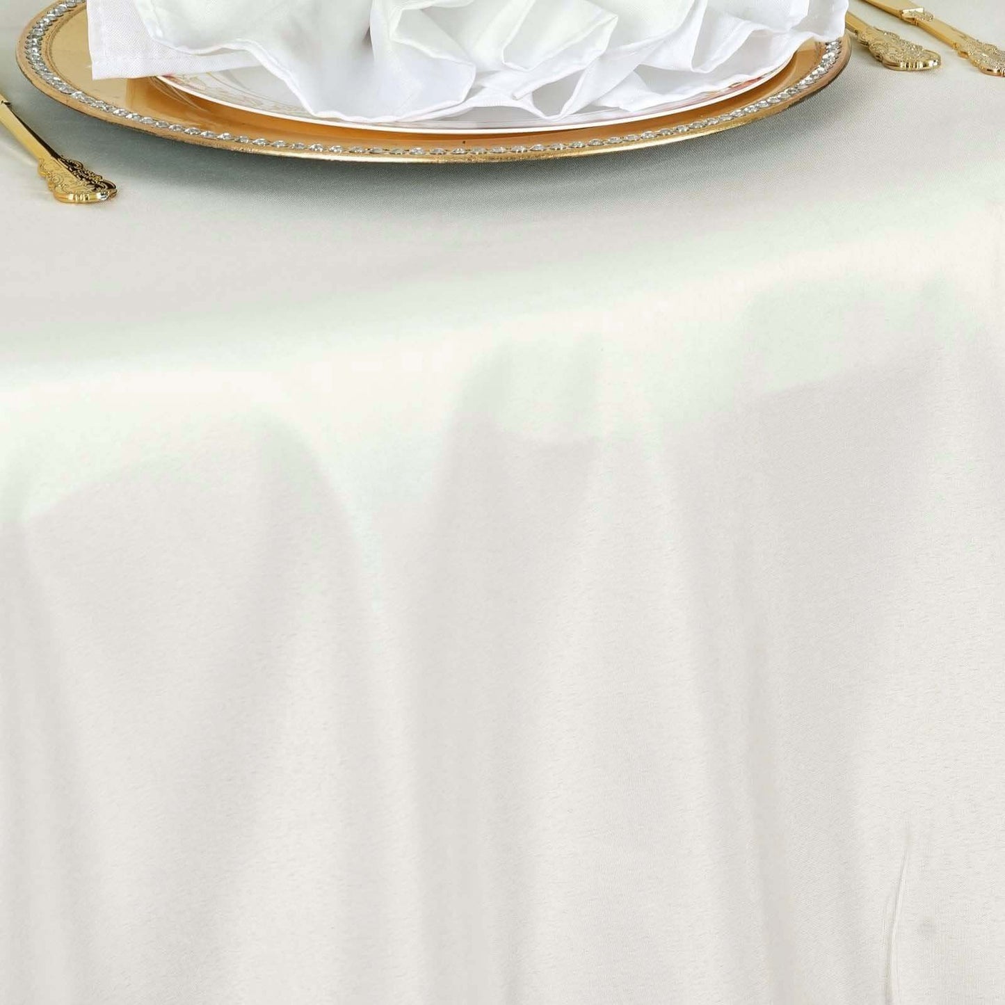 Ivory seamless round tablecloth for 6-foot tables with floor-length drop.