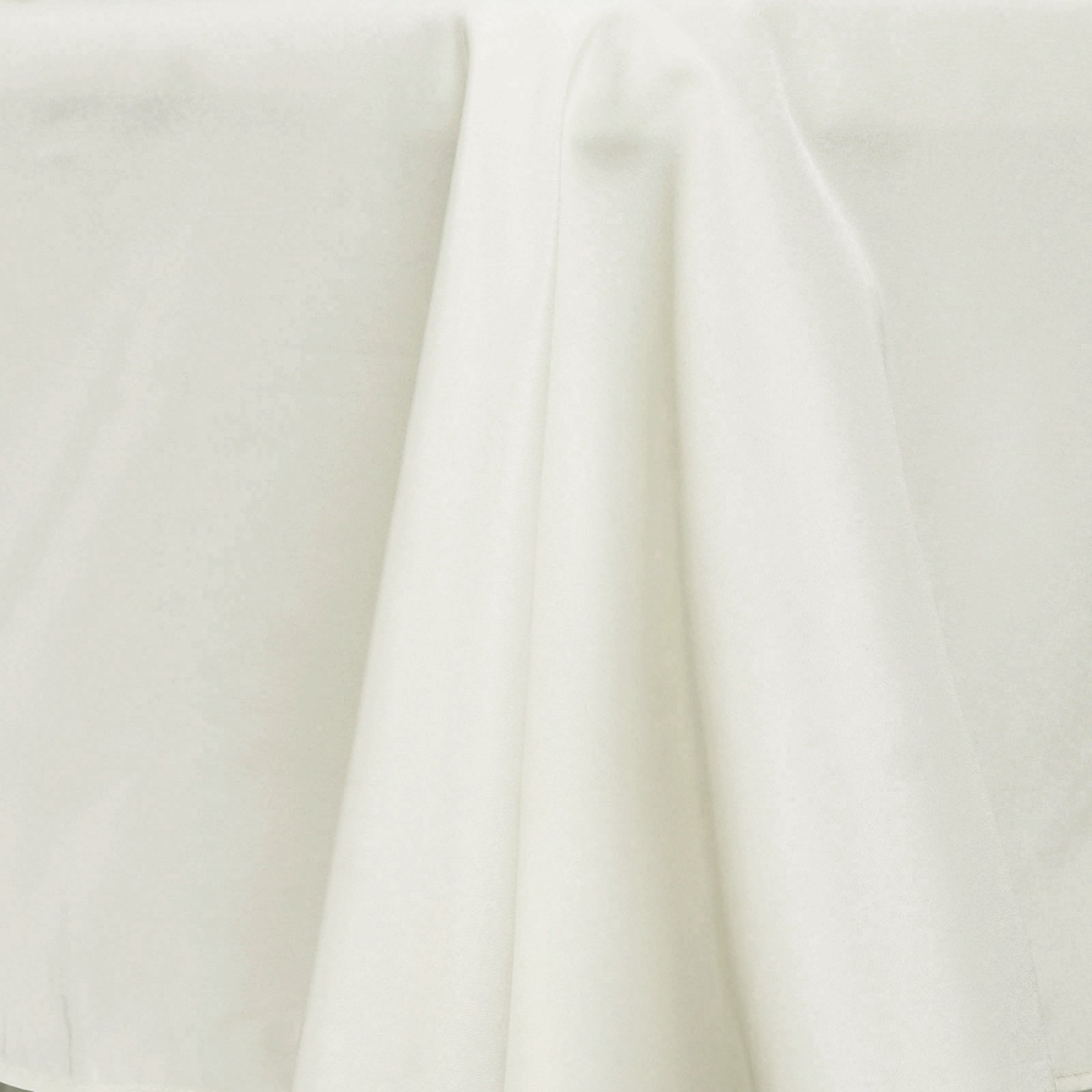 Ivory seamless polyester tablecloth for 6-foot tables with floor-length drop.