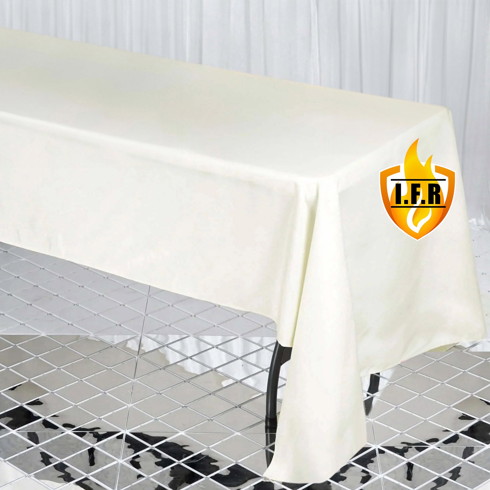 Ivory fire retardant rectangular tablecloth 60"x126" in premium polyester.
