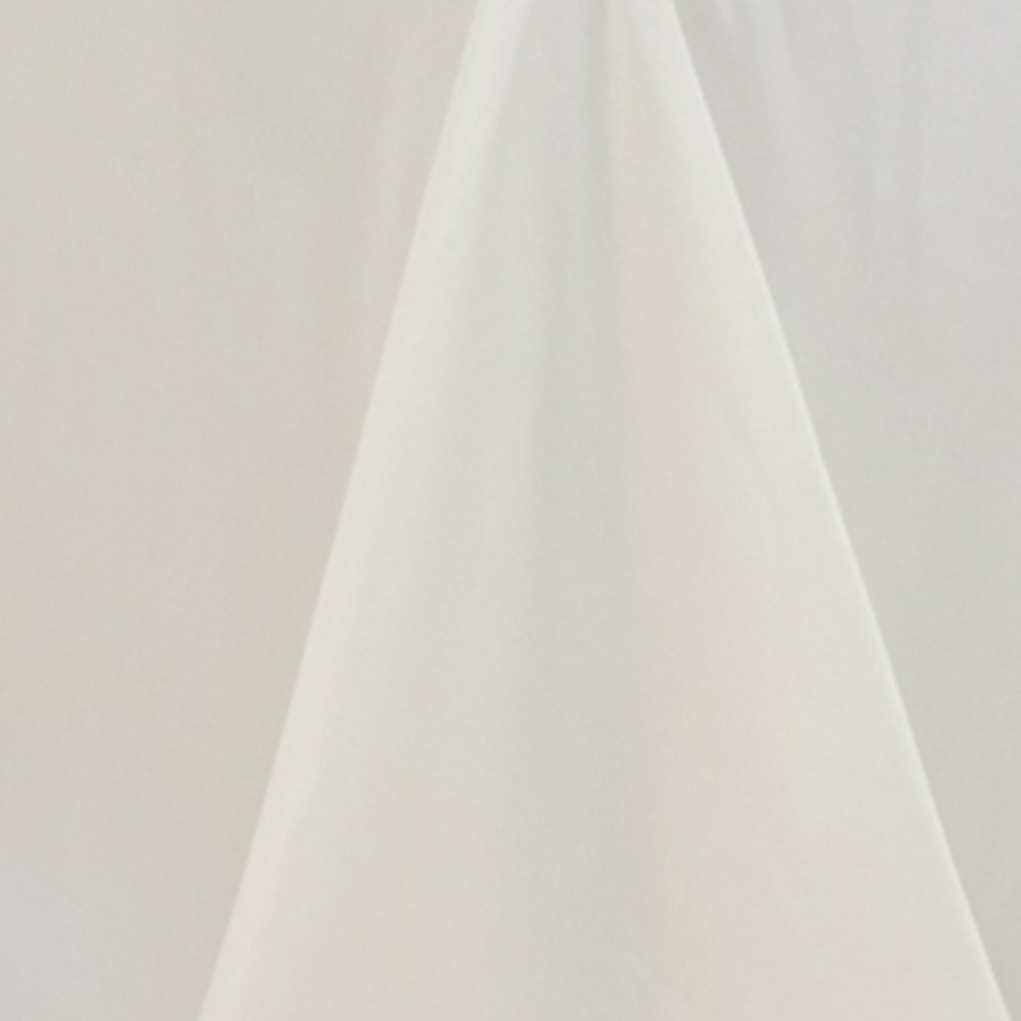Ivory fire retardant rectangular tablecloth for 6-foot table.