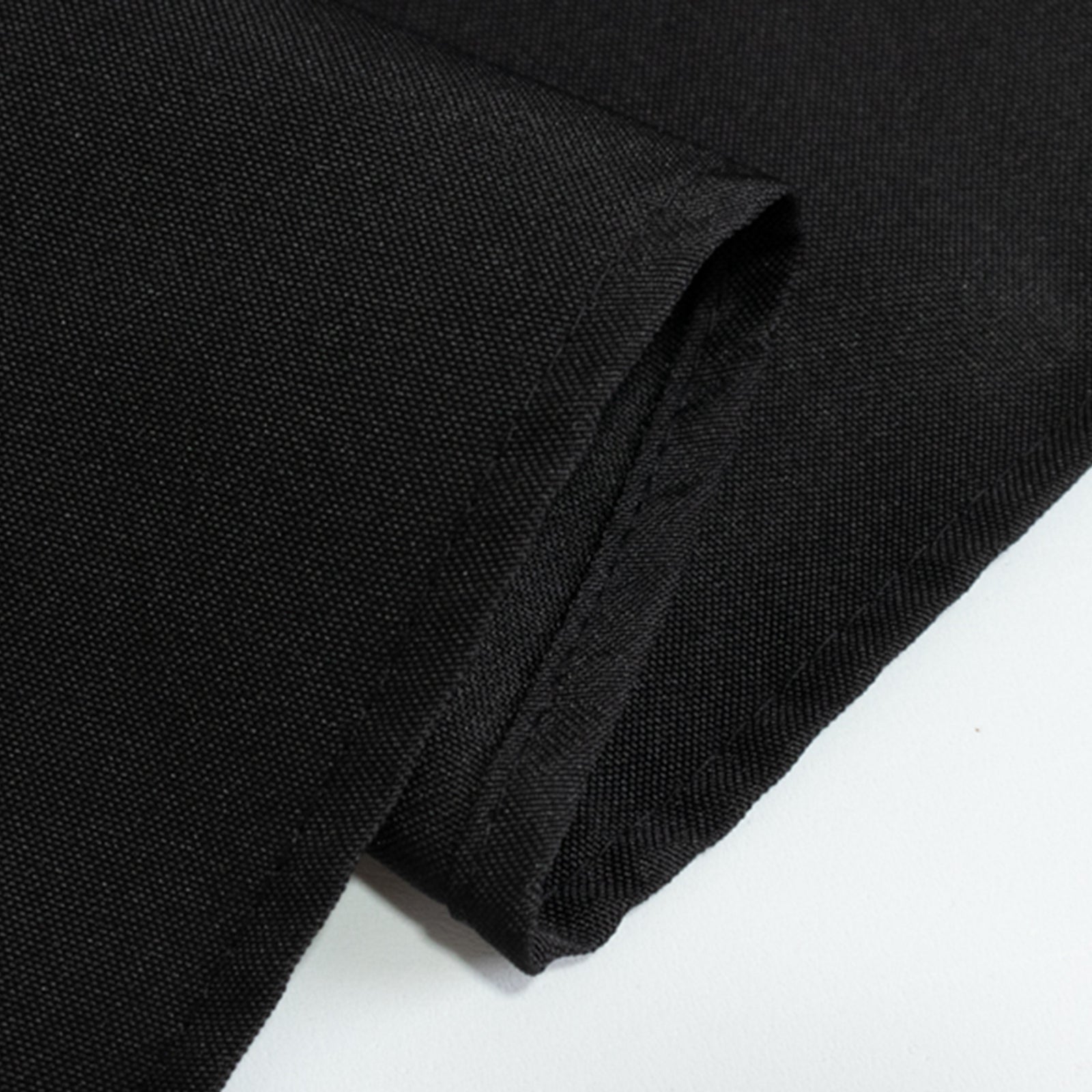 Black fire retardant tablecloth in premium polyester material.