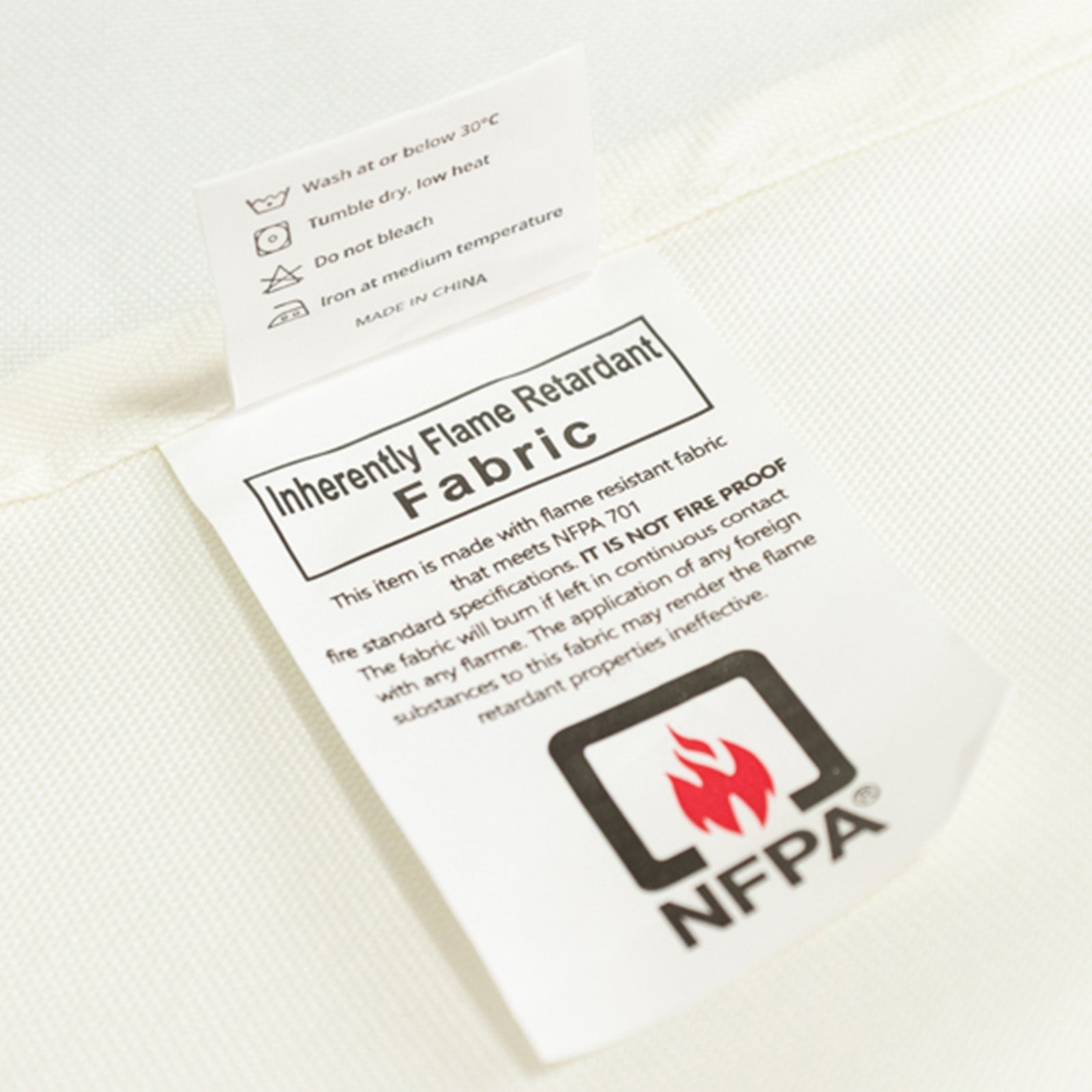 Ivory fire retardant fitted tablecloth for 72"x30" tables.