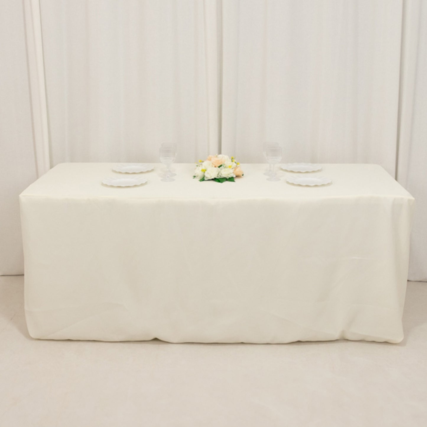Ivory fitted tablecloth for 72"x30" rectangular tables.