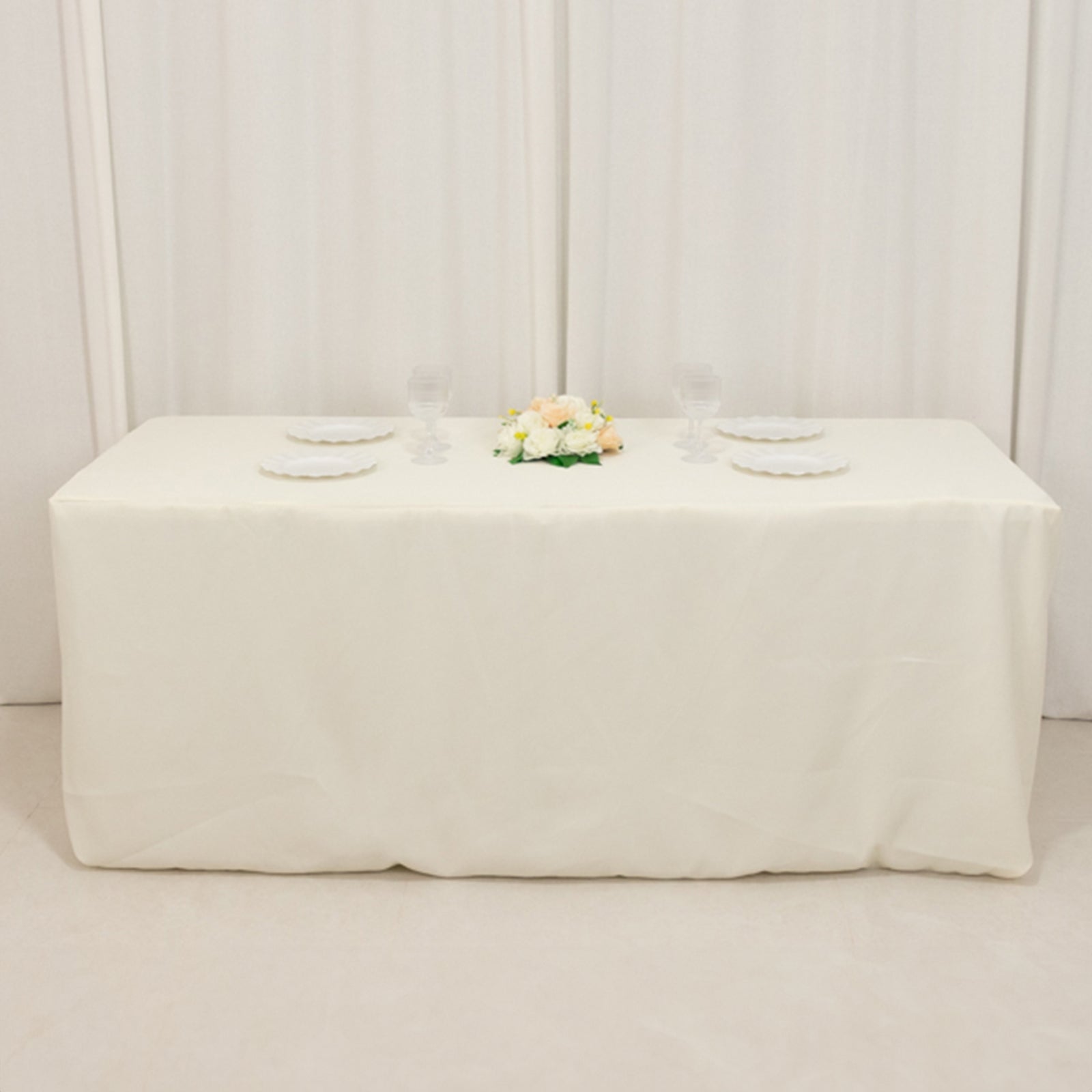 Ivory fitted tablecloth for 72"x30" rectangular tables.