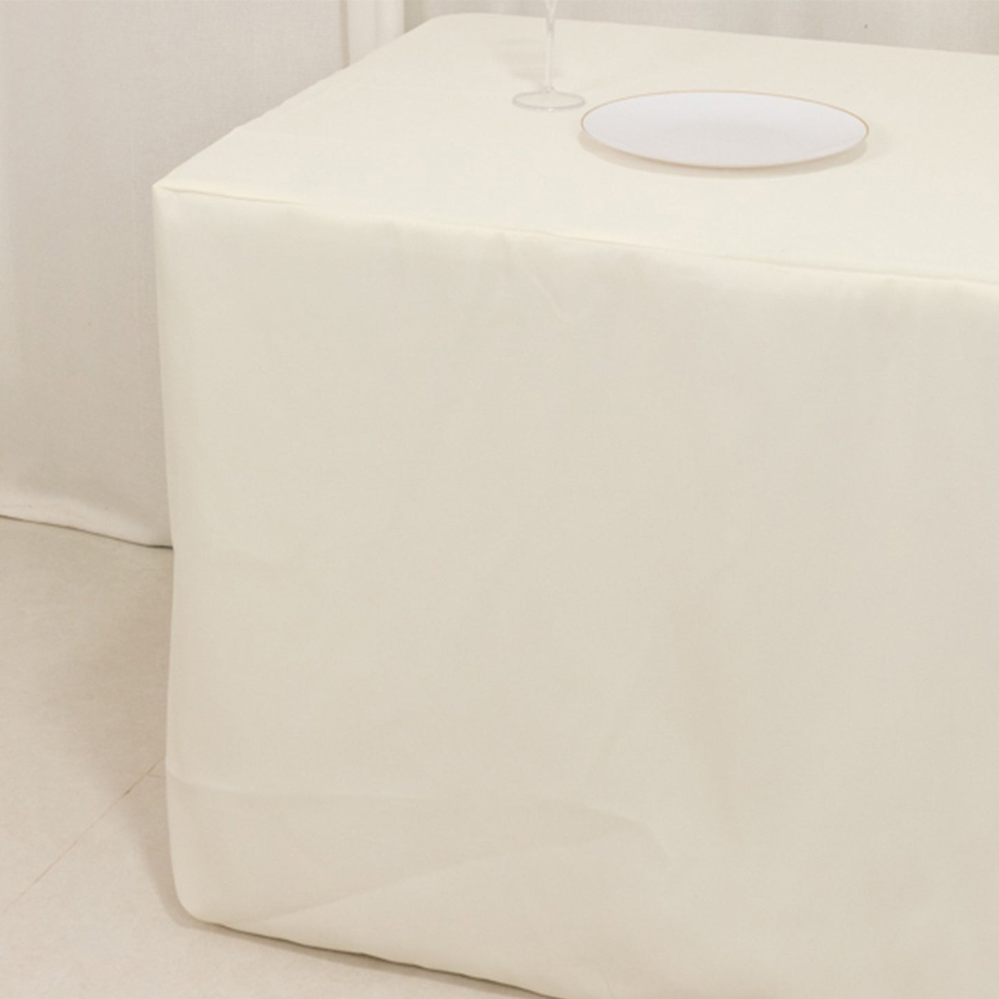Ivory fire retardant fitted tablecloth for 72"x30" tables.