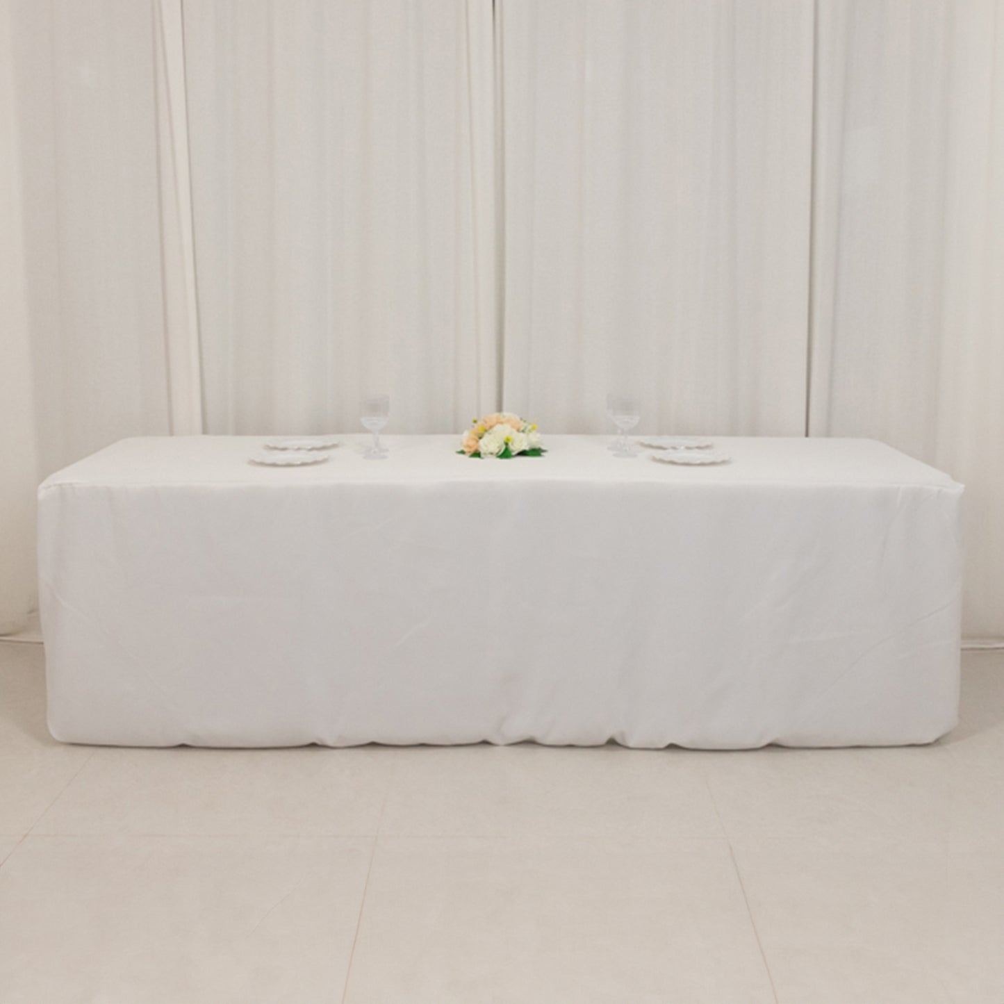 White fitted tablecloth for 96"x30" tables, premium polyester material.