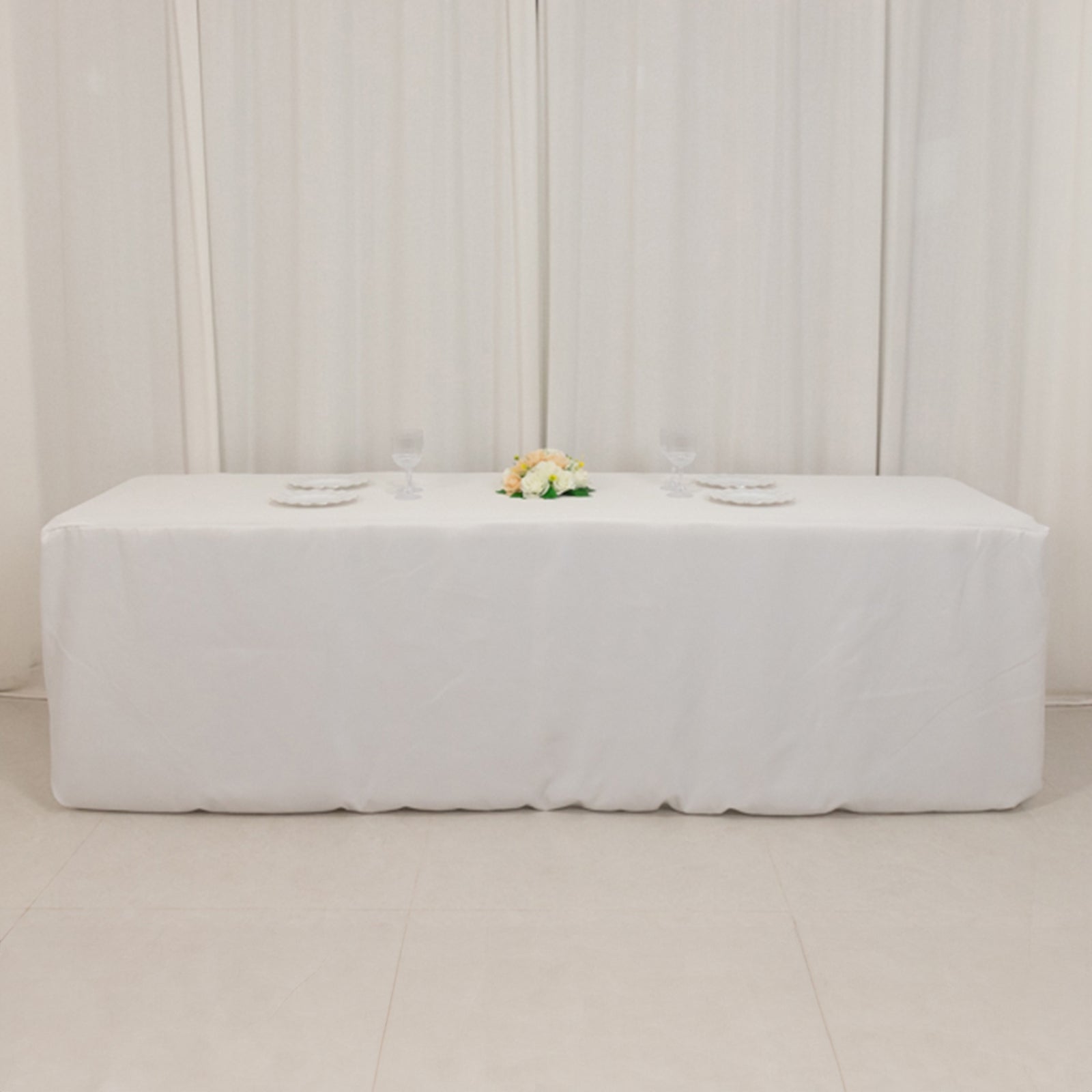 White fitted tablecloth for 96"x30" tables, premium polyester material.