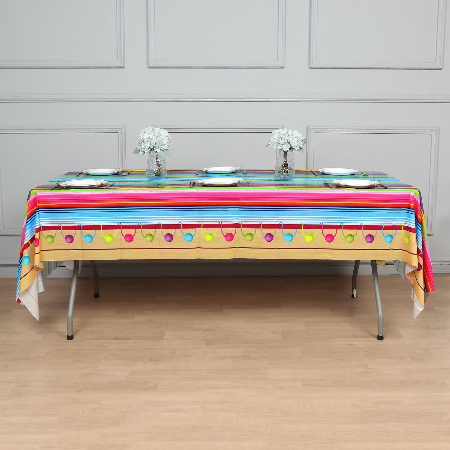 Colorful Mexican serape plastic table cover, 54"x108", perfect for Cinco de Mayo.