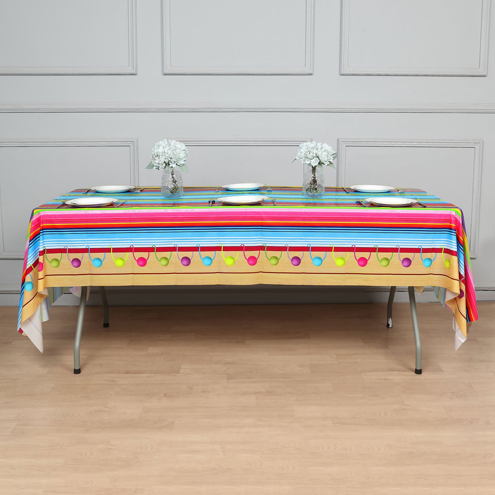 Colorful Mexican serape plastic table cover, 54"x108", perfect for Cinco de Mayo.