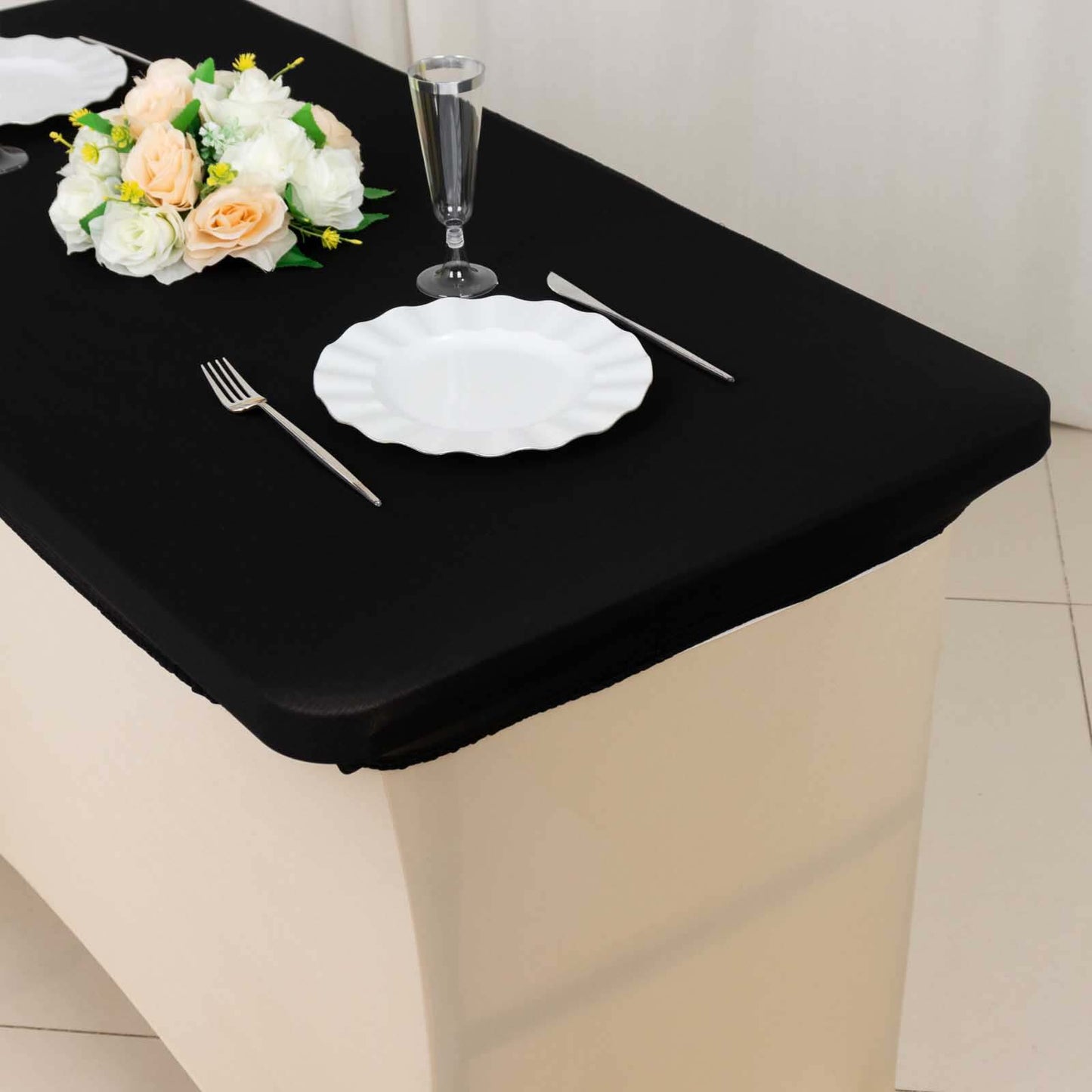 Black stretch spandex tablecloth for 48"x30" tables, wrinkle-free fitted cover.