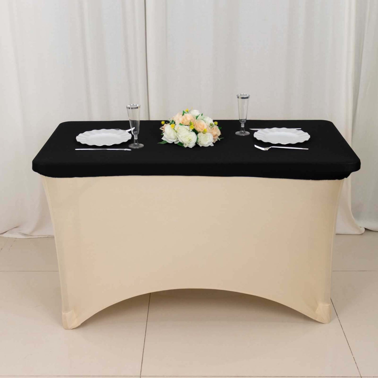Black fitted tablecloth cover for 48"x30" tables, wrinkle-free design.