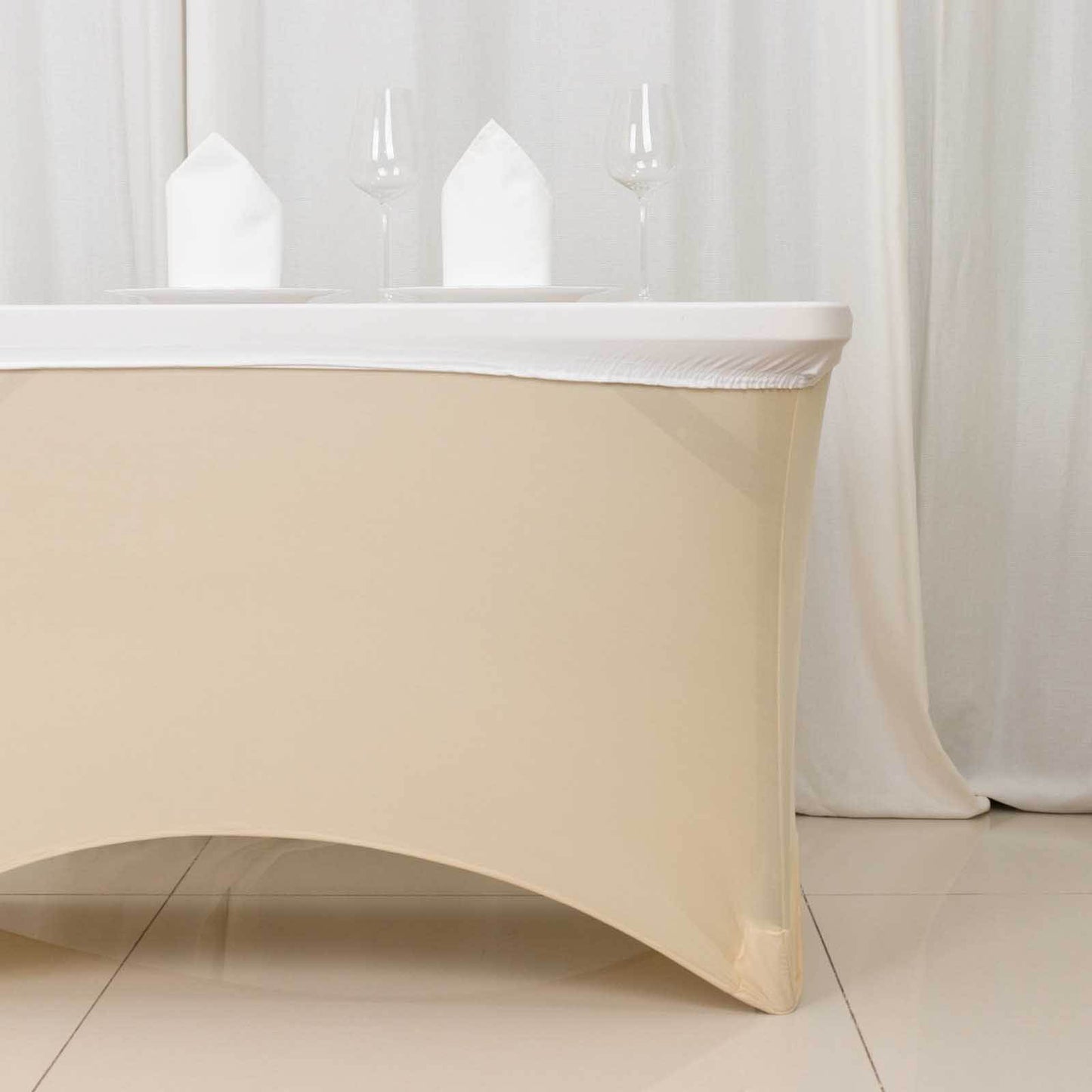 White fitted tablecloth cover for 48"x30" tables. Wrinkle-free design.