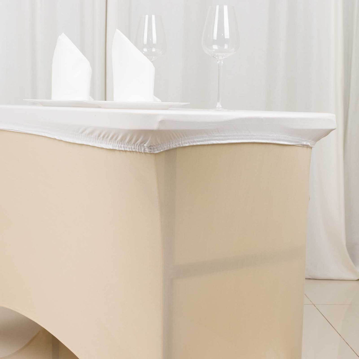 White fitted tablecloth cover for 48"x30" table, wrinkle-free and stretchy.