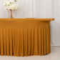 Gold wavy spandex fitted table skirt for 72"x30" tables with ruffles.