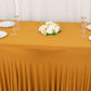 Gold fitted tablecloth with ruffles for 72"x30" tables.