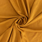 Gold stretchy fitted tablecloth fabric in a wavy design. #whtbkgd