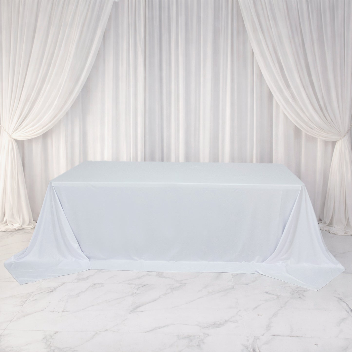 White Scuba Rectangular King Tablecloth for 8ft tables, wrinkle-free and stain-resistant.