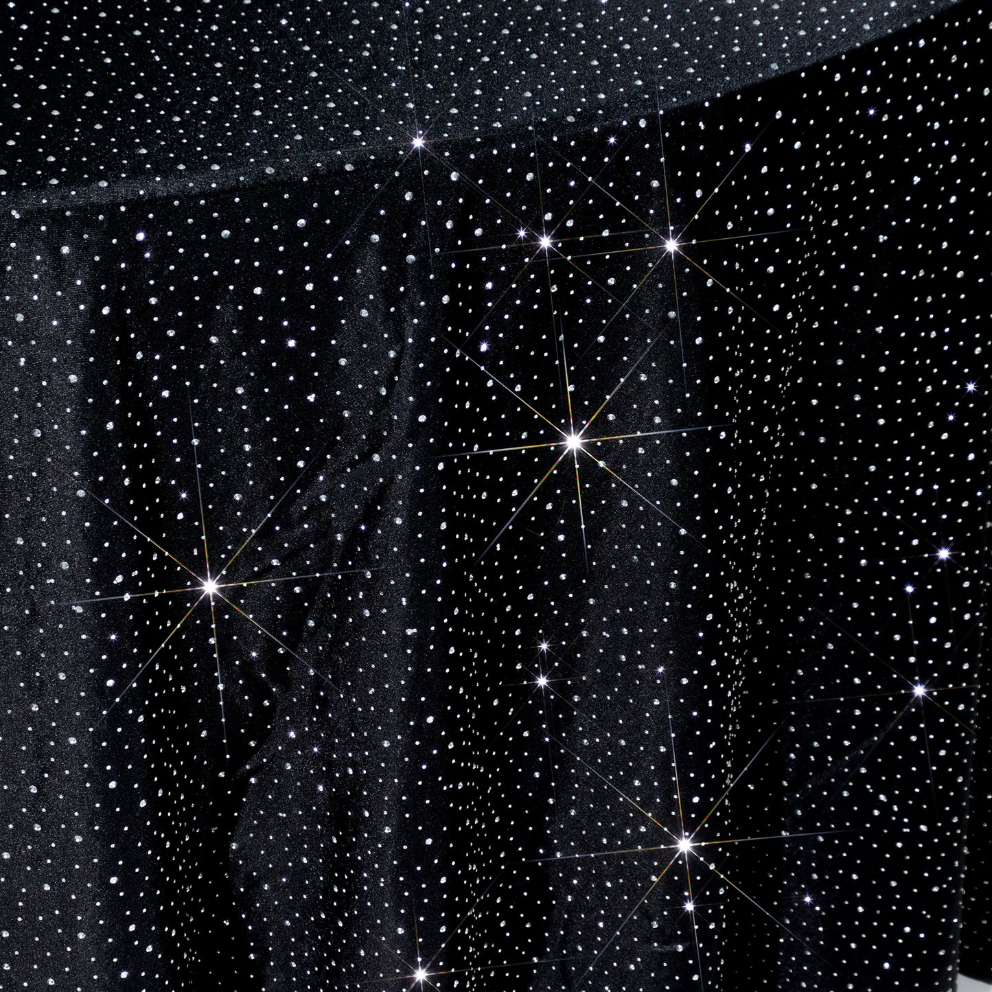 Black round tablecloth with rhinestone accents, seamless and wrinkle-free.