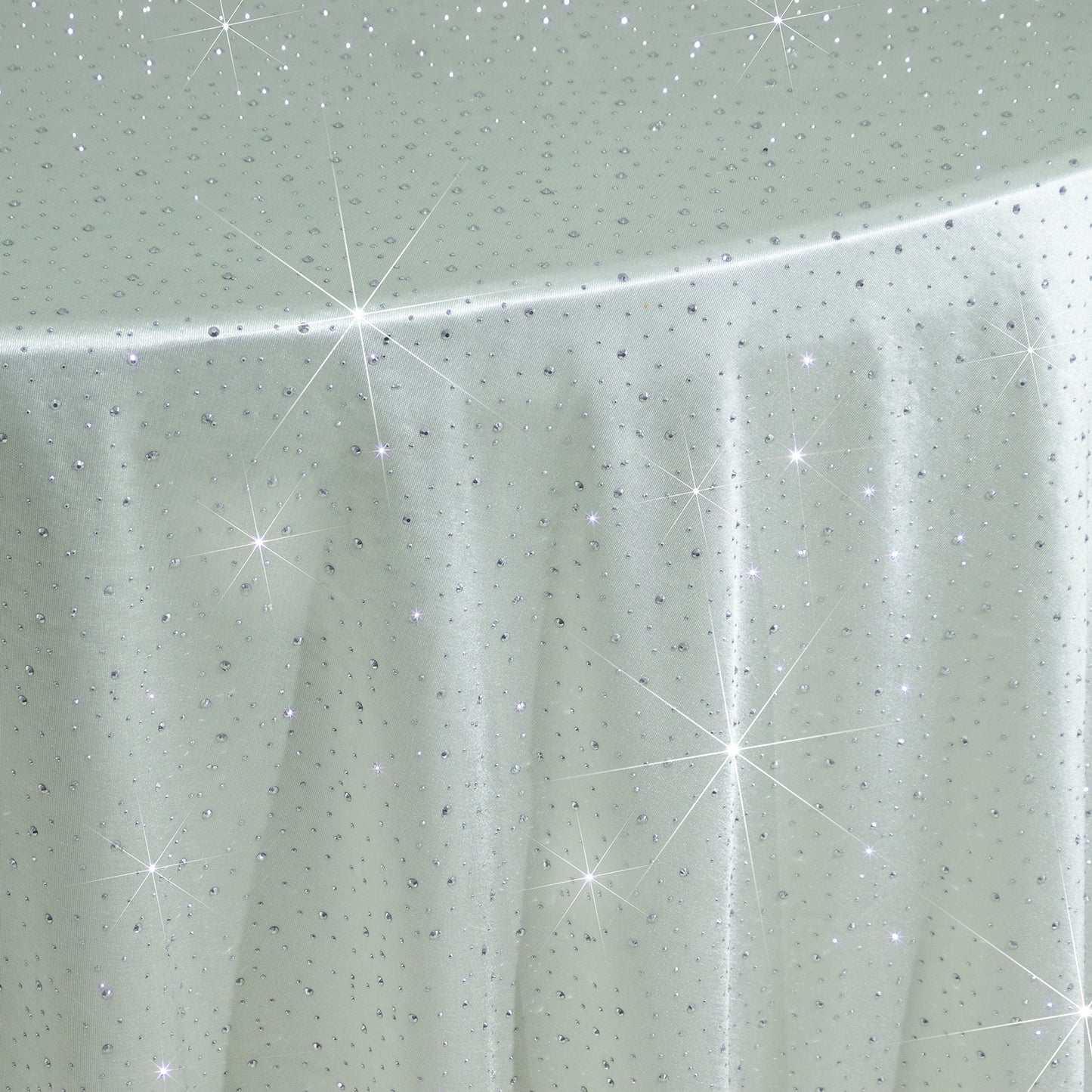 Pearl white round tablecloth with rhinestone accents, seamless and wrinkle-free.