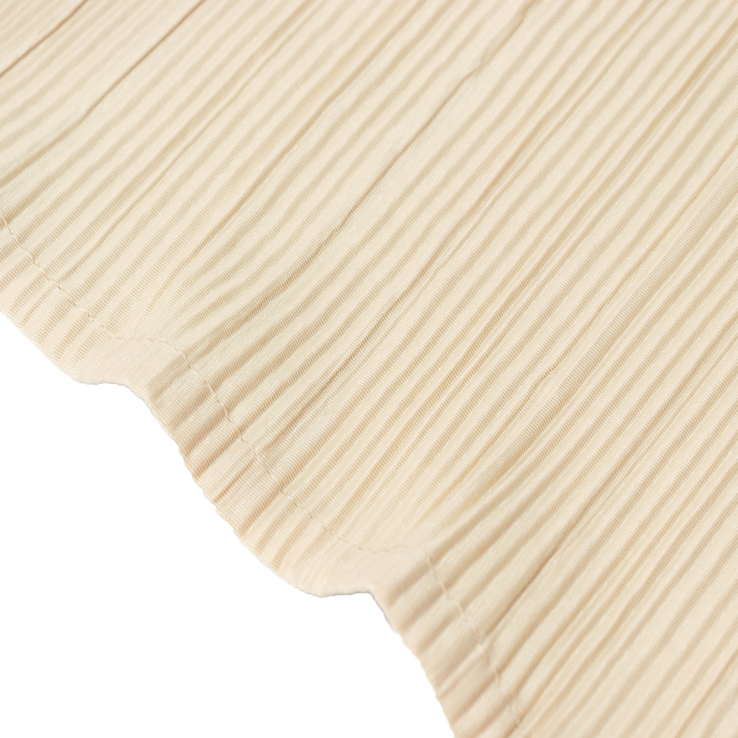 Beige accordion pleated scuba tablecloth, wrinkle-free and stain-resistant.
