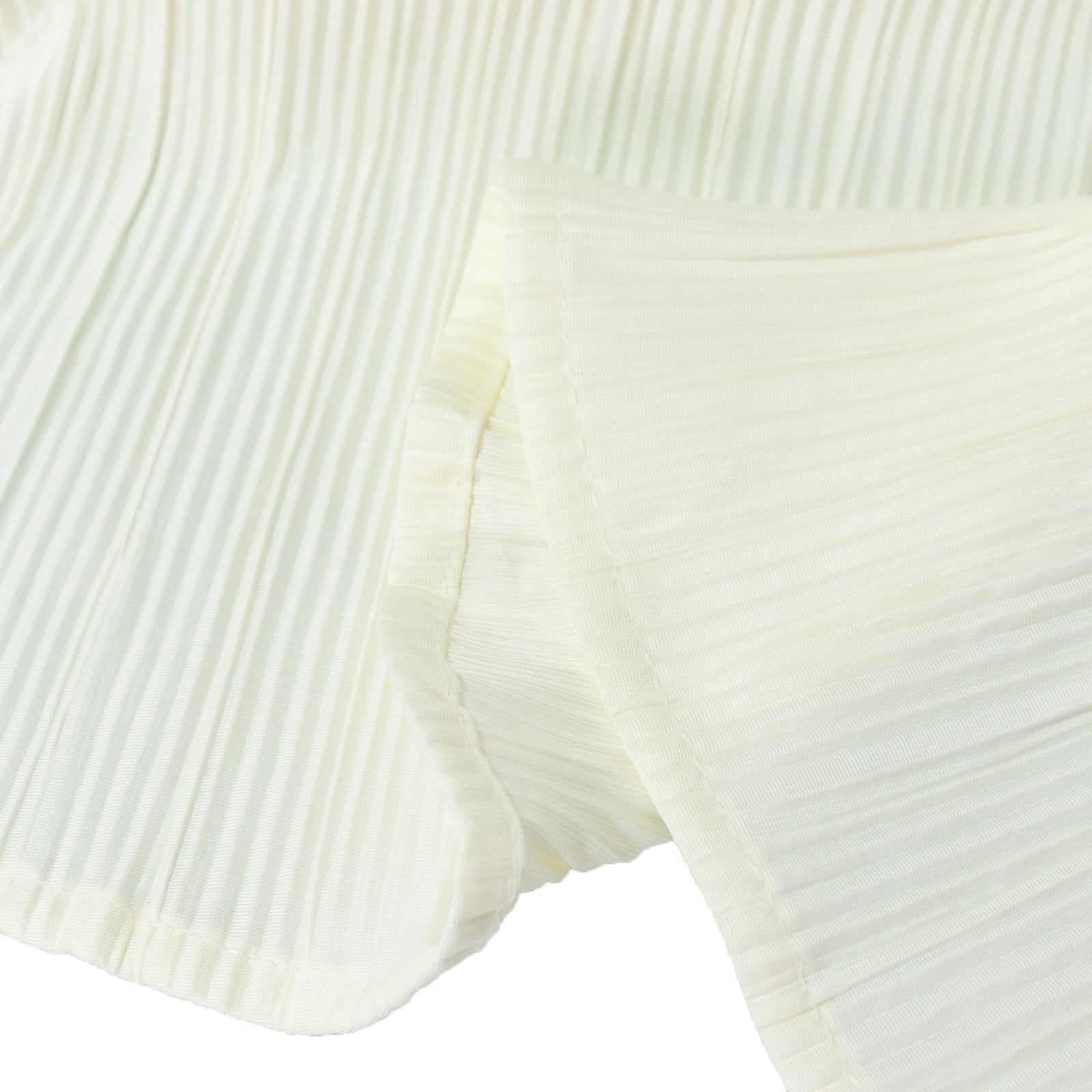 Ivory accordion pleated scuba tablecloth, wrinkle-free and stain-resistant.