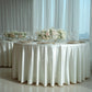 Pearl white round tablecloth with rhinestone accents on an elegant dining table.