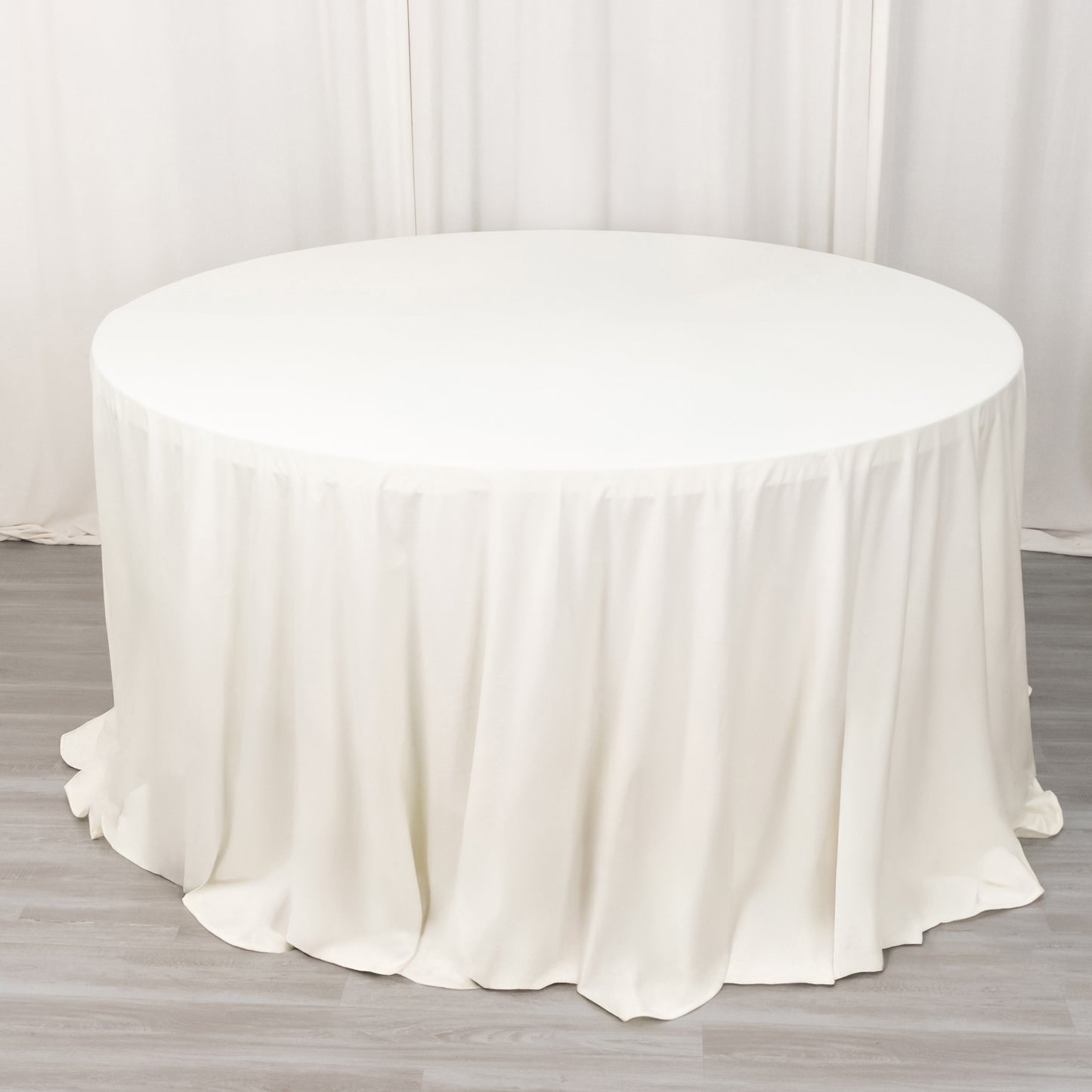 132" Ivory Scuba Wrinkle Free Round Tablecloth, Seamless Scuba Polyester Tablecloth