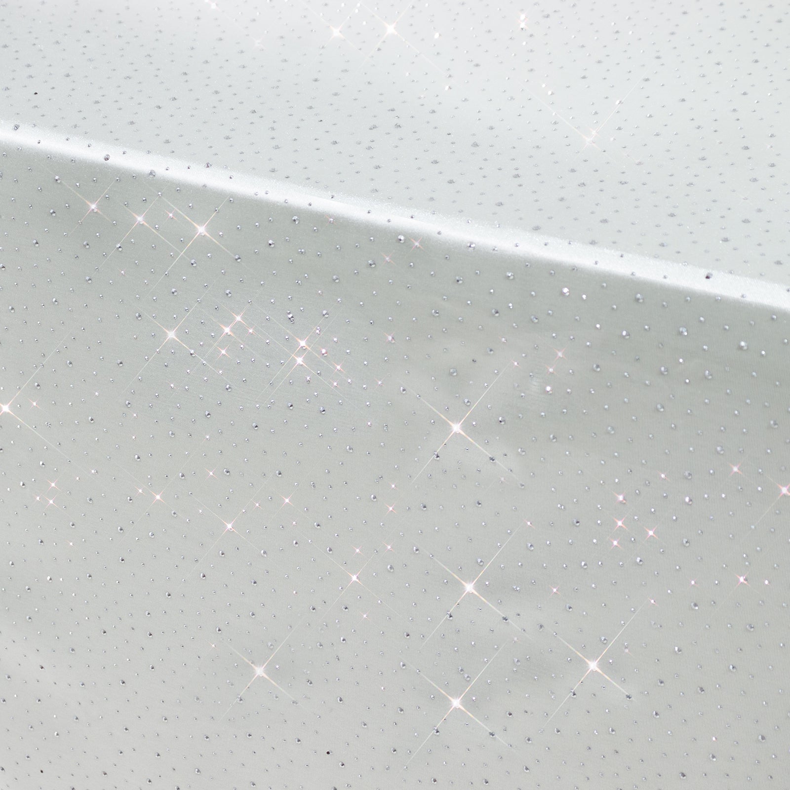 Pearl white rectangular tablecloth with rhinestone accents, seamless and wrinkle-free.