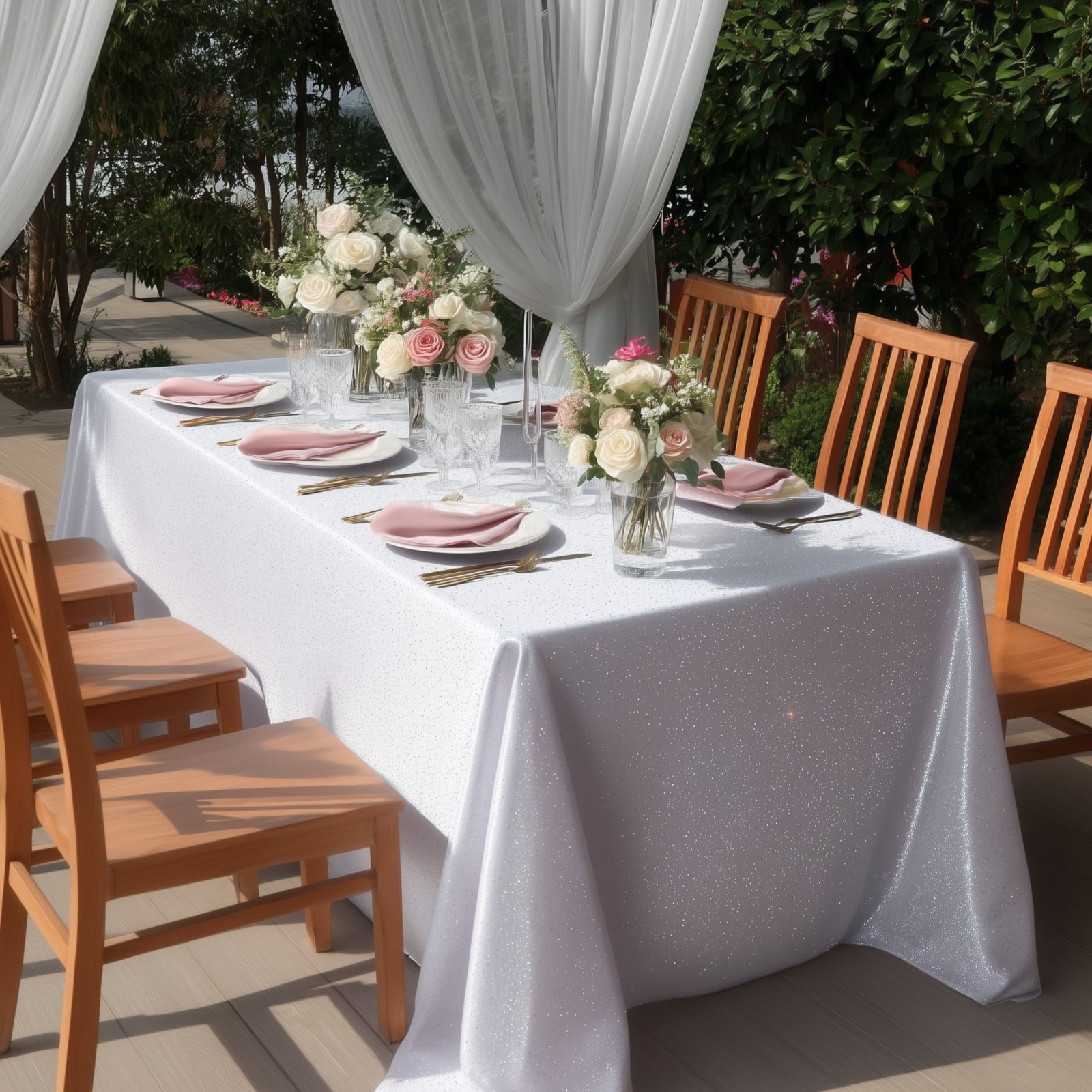 White Scuba Rectangular Tablecloth with Rhinestone Accents on a dining table.