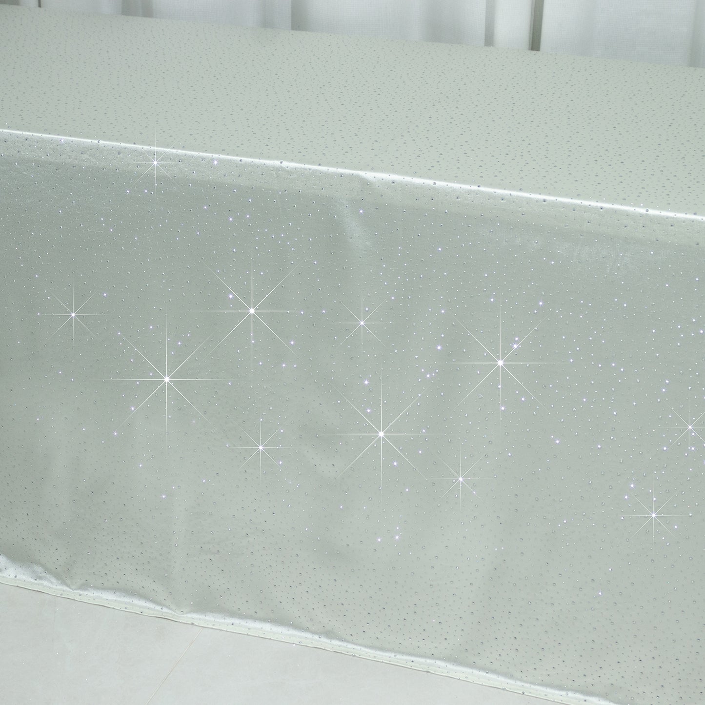 Pearl white rectangular tablecloth with rhinestone accents.