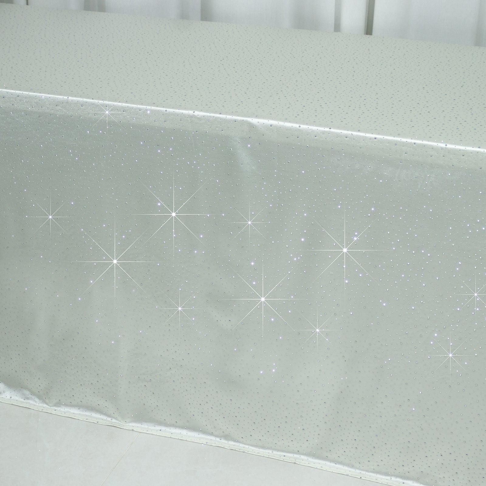 Pearl white rectangular tablecloth with rhinestone accents.