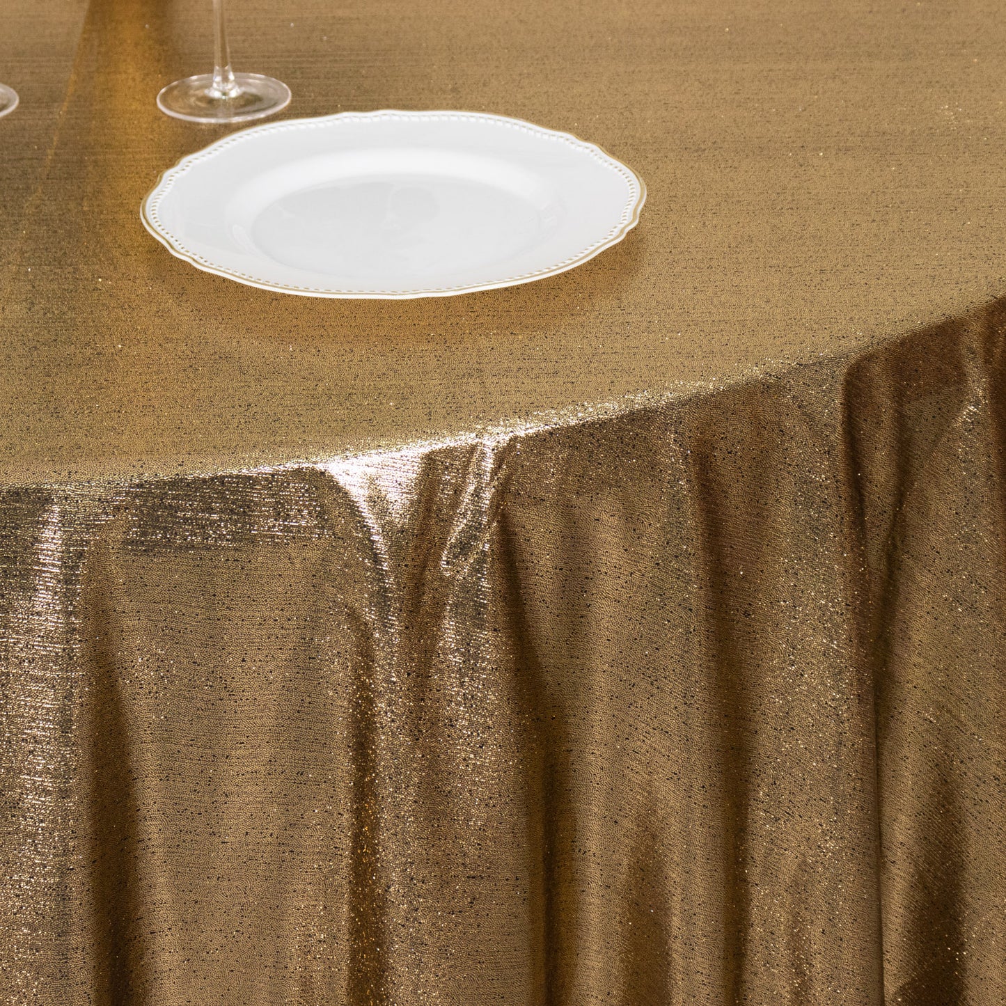 Antique gold shimmer sequin tablecloth with sparkle glitter finish.
