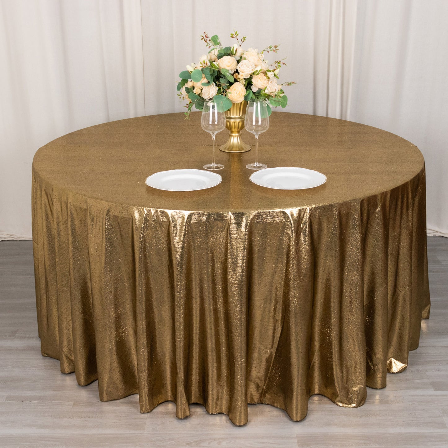Antique gold shimmer sequin tablecloth with a wrinkle-free finish.
