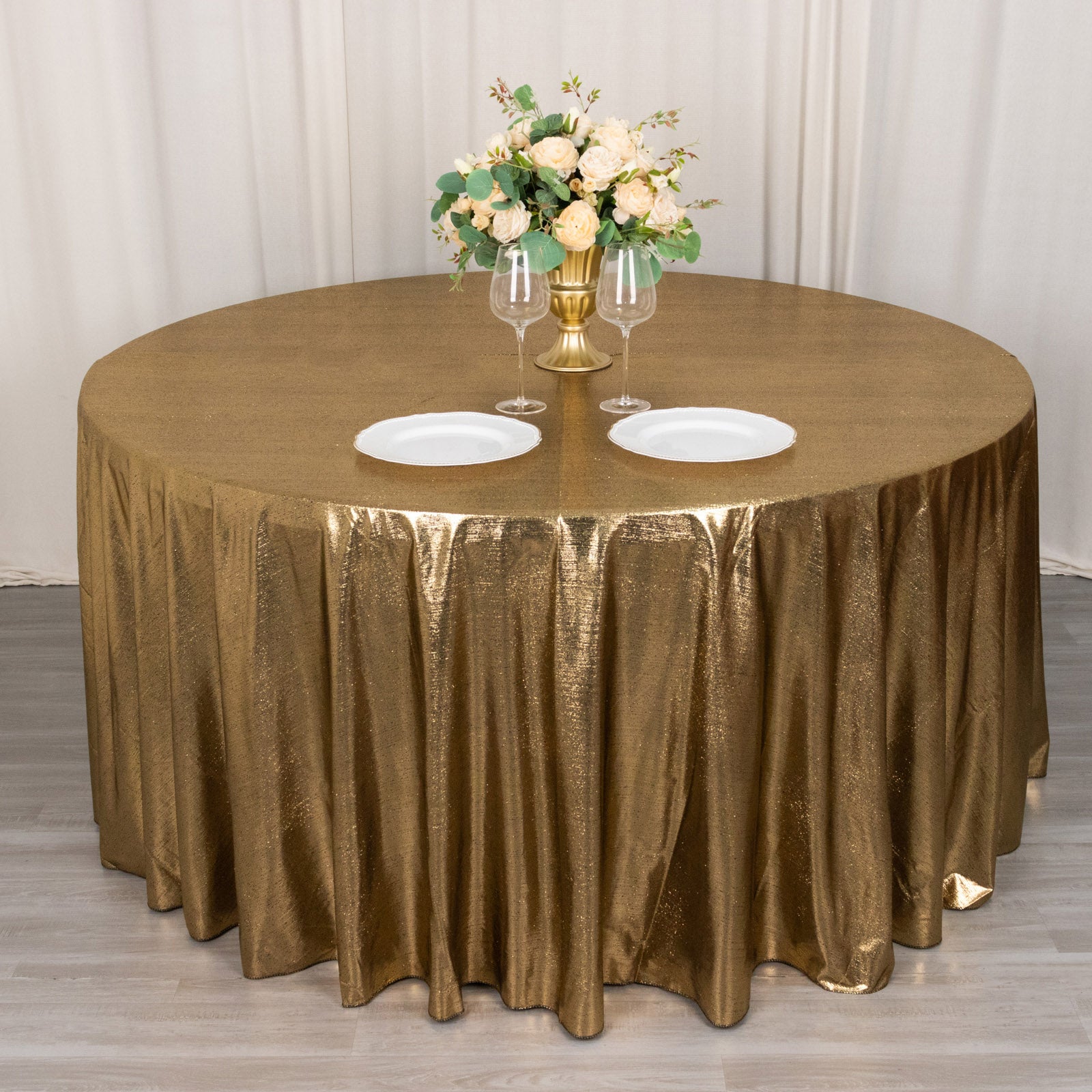Antique gold shimmer sequin tablecloth with a wrinkle-free finish.