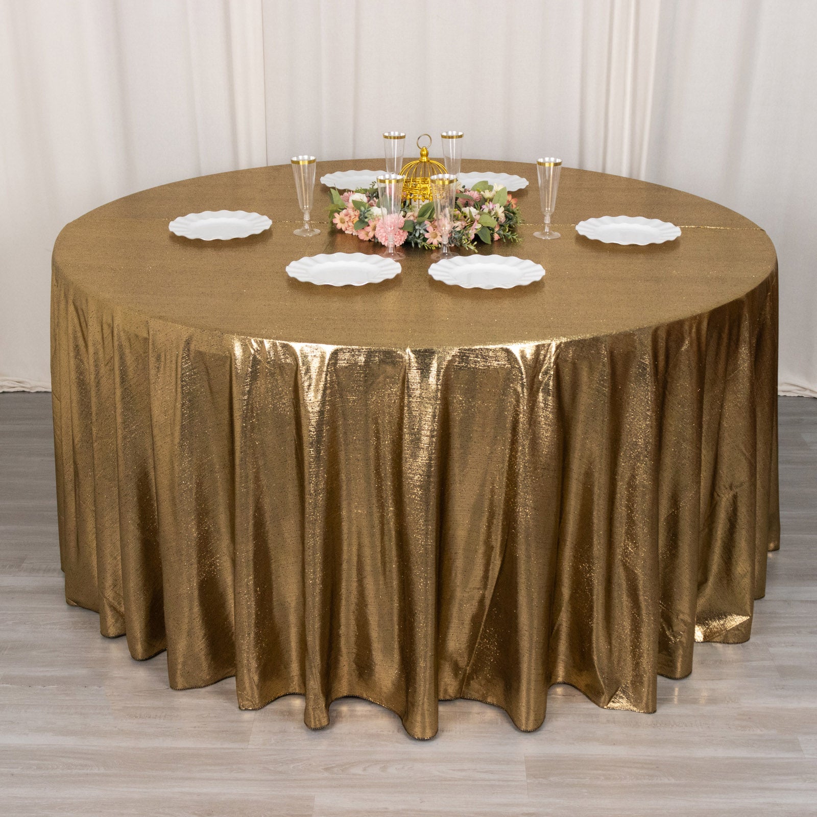 120" antique gold shimmer sequin tablecloth with a sparkling finish.