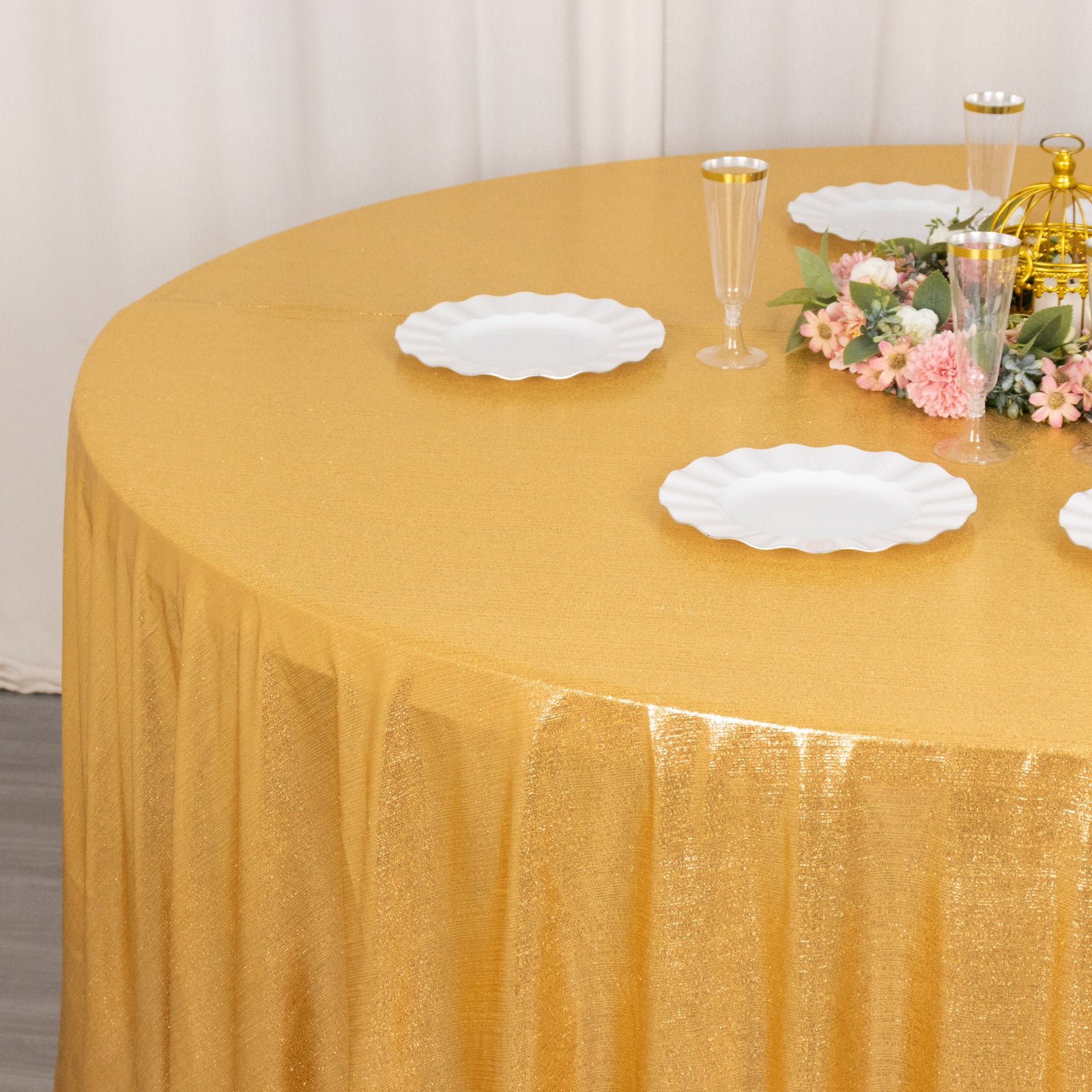 Gold shimmer sequin dots tablecloth for elegant events and celebrations.