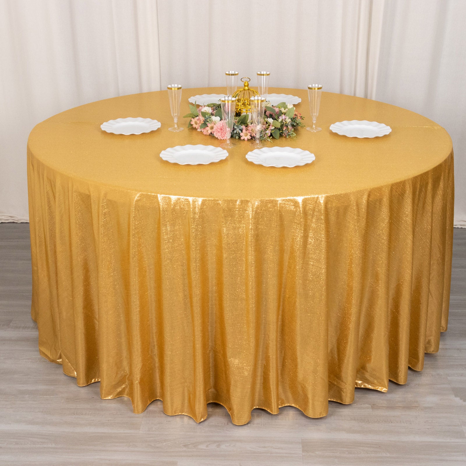 Gold shimmer sequin tablecloth for elegant events and celebrations.