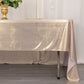 Shiny blush rectangular tablecloth with shimmer sequin dots on a dining table.