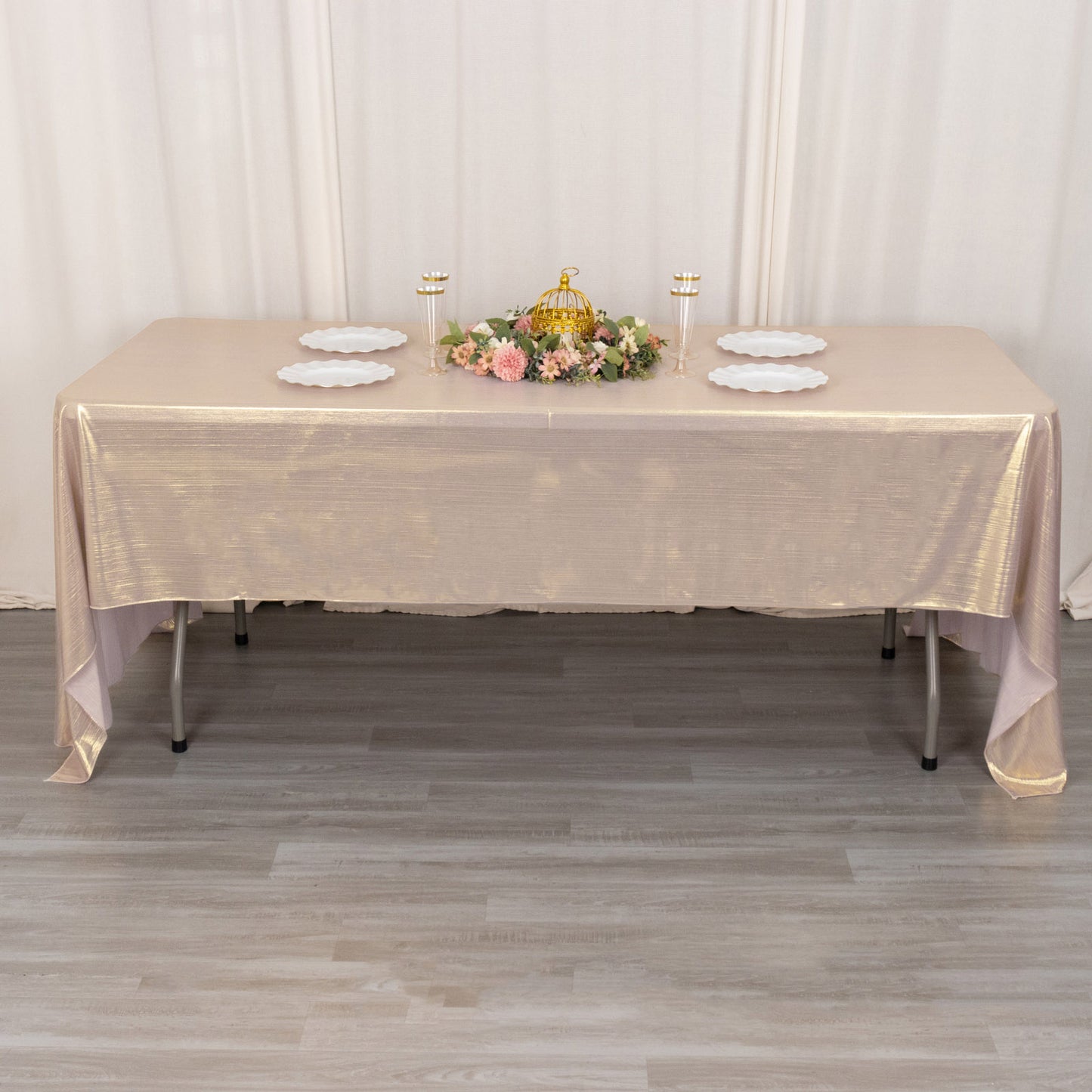 Shiny blush polyester rectangular tablecloth with shimmer sequin dots.