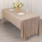 Shiny blush rectangular tablecloth with shimmer sequin dots on a banquet table.