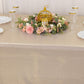 Shiny blush rectangular tablecloth with shimmer sequin dots on a decorated table.
