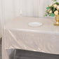 Shiny beige rectangular tablecloth with shimmer sequin dots on a dining table.
