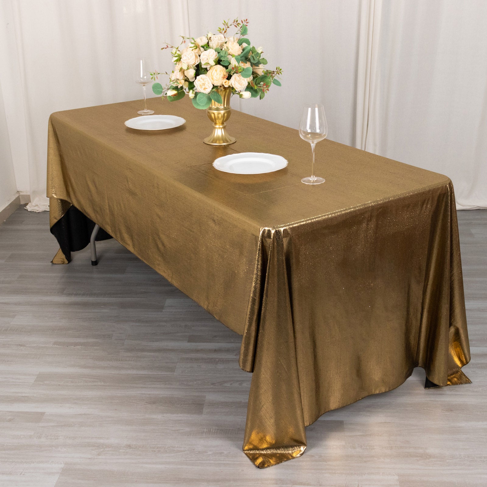Shiny antique gold rectangular tablecloth with shimmer sequin dots