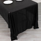 Shiny black polyester tablecloth with sequin dots for elegant table settings.