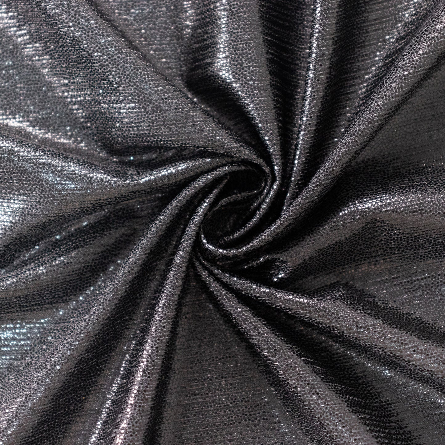 Shiny black polyester tablecloth with shimmer sequin dots.