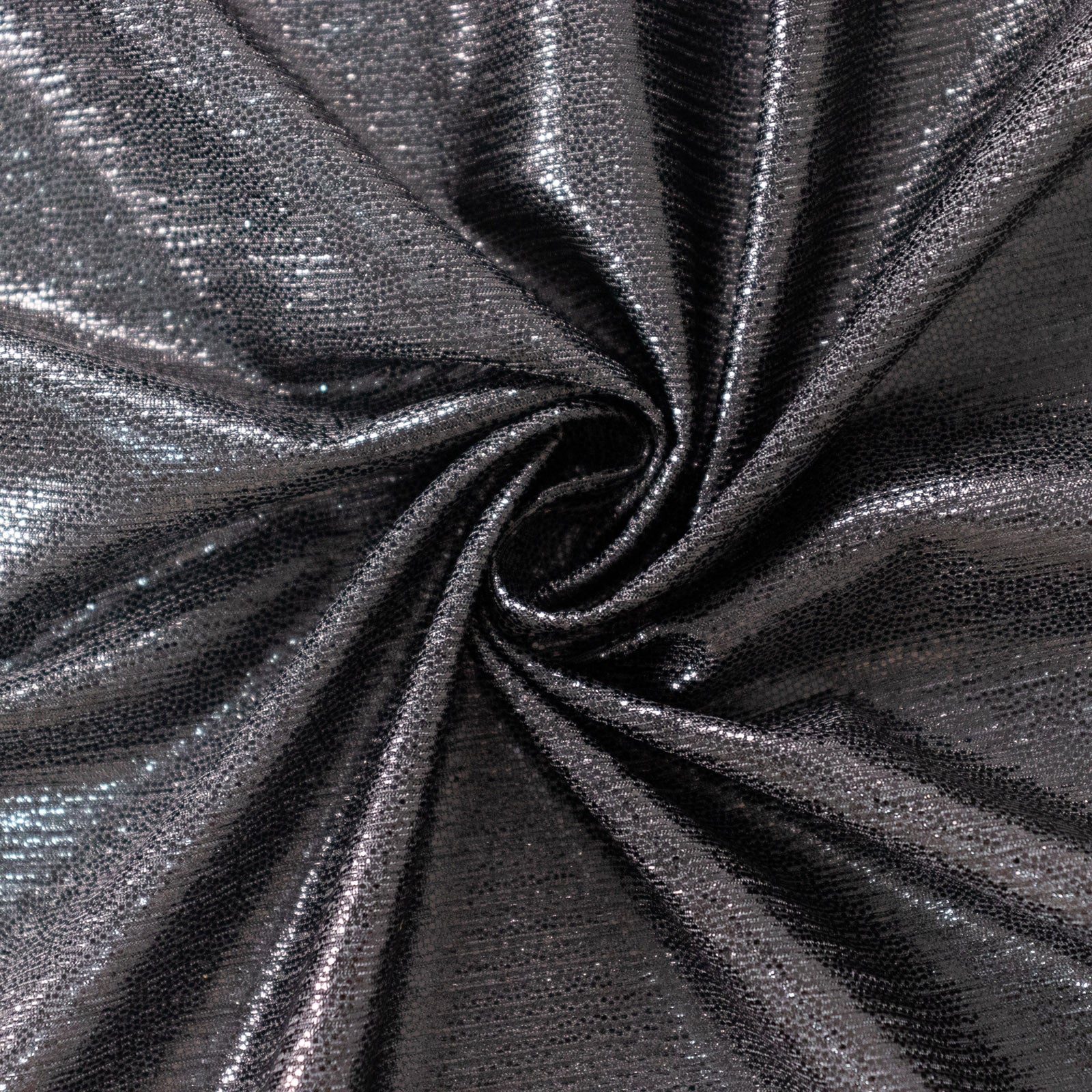 Shiny black polyester tablecloth with shimmer sequin dots.