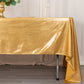 Shiny gold rectangular tablecloth with shimmer sequin dots.