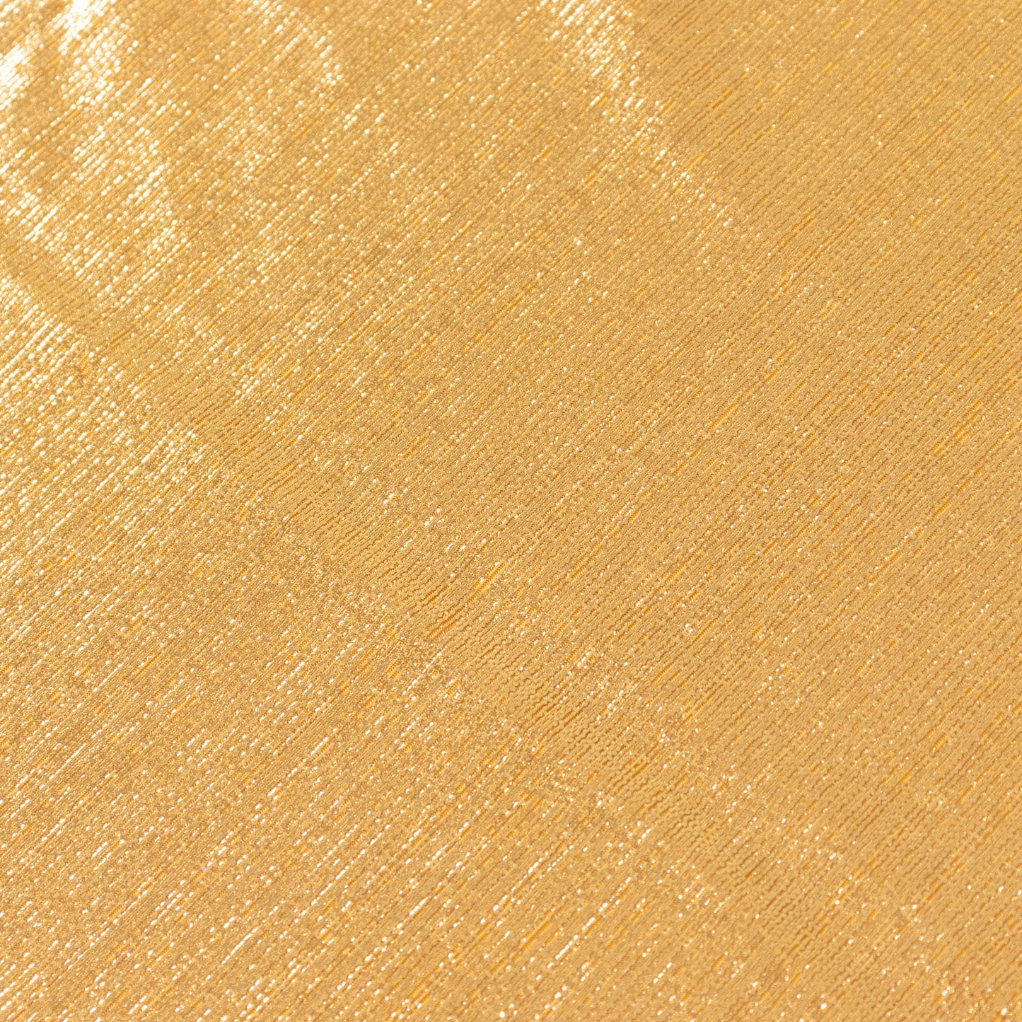 Shiny gold rectangular tablecloth with shimmer sequin dots.