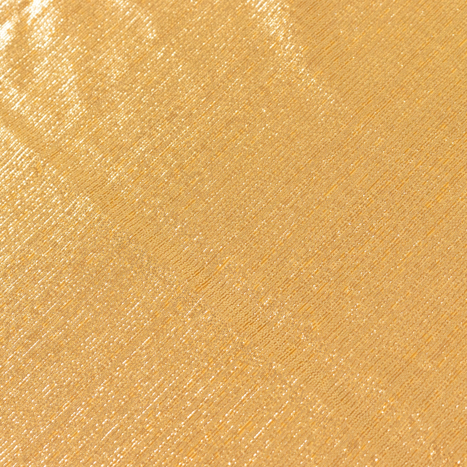 Shiny gold rectangular tablecloth with shimmer sequin dots.