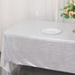 Shiny silver rectangular tablecloth with shimmer sequin dots on a dining table.